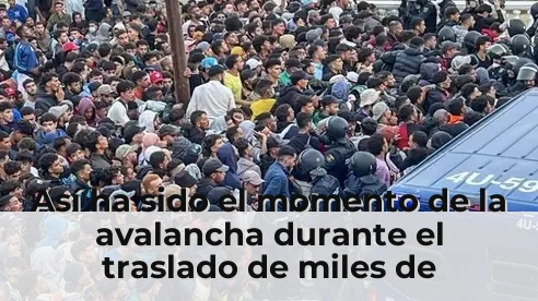 Así ha sido el momento de la avalancha durante el traslado de miles de migrantes al nuevo campamento de Ceuta