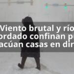 Viento brutal y río desbordado confinan pueblo y evacúan casas en directo