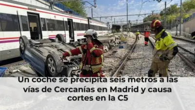 Un coche se precipita seis metros a las vías de Cercanías en Madrid y causa cortes en la C5